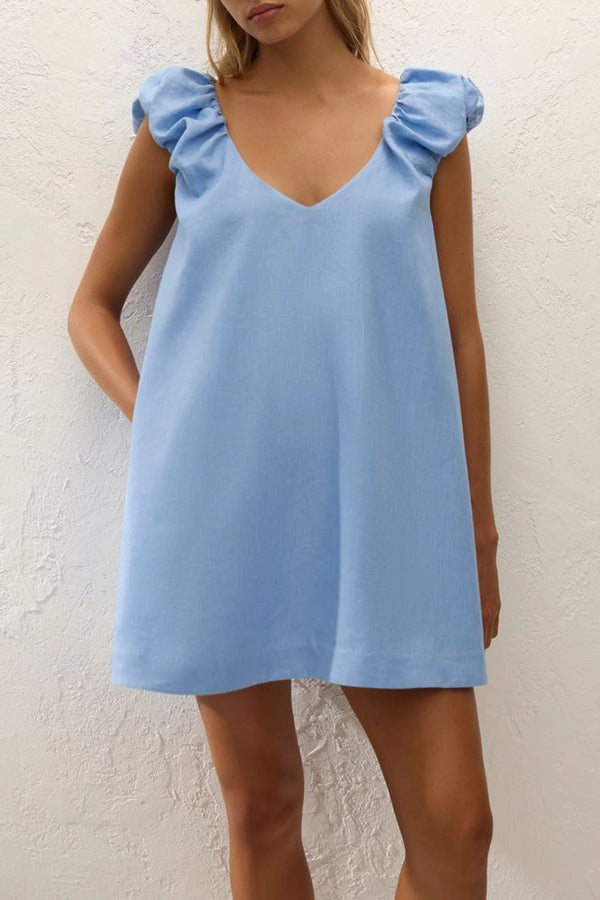 Flor Mini Dress Sky Blue by Faithfull the Brand – a mini dress with frill sleeves and soft A line fit. Perfect for summer styling.
