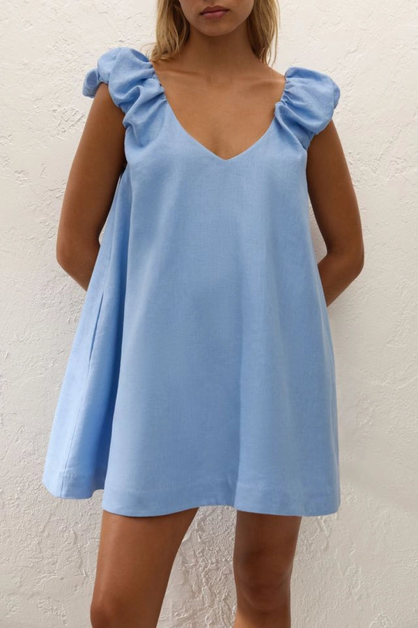 Flor Mini Dress Sky Blue by Faithfull the Brand – a mini dress with frill sleeves and soft A line fit. Perfect for summer styling.