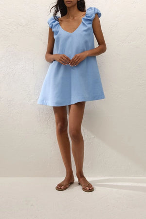 Flor Mini Dress Sky Blue by Faithfull the Brand – a mini dress with frill sleeves and soft A line fit. Perfect for summer styling.