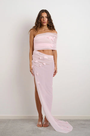 Floral Lara Dress by DŽO – a pink two-piece with bandeau top and ruched skirt. Perfect for summer event styling.