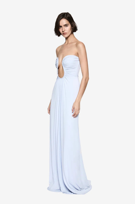 Florence Jersey Dress in Skywriting by Misha, a teal blue strapless maxi with plunge neckline and waist ruching. Perfect for formal events or galas.