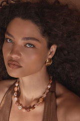 Florence Necklace by Amber Sceats, gold necklace with red quartz beads. Perfect for events or adding a warm statement touch.