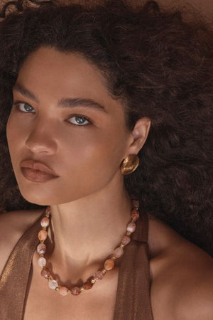 Florence Necklace by Amber Sceats, gold necklace with red quartz beads. Perfect for events or adding a warm statement touch.