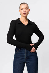Florence Polo Top in Black by Mossman, a ribbed jersey long sleeve polo with thumb openings and sculpted fit.