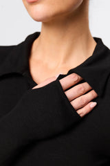 Florence Polo Top in Black by Mossman, a ribbed jersey long sleeve polo with thumb openings and sculpted fit.