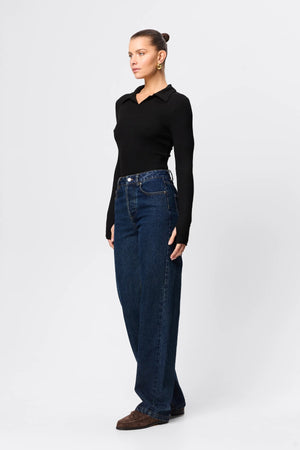 Florence Polo Top in Black by Mossman, a ribbed jersey long sleeve polo with thumb openings and sculpted fit.