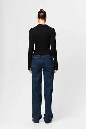Florence Polo Top in Black by Mossman, a ribbed jersey long sleeve polo with thumb openings and sculpted fit.