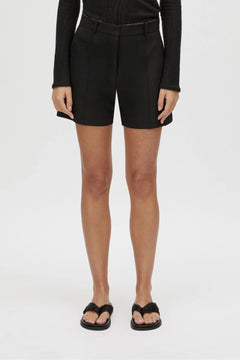 Floret Tailored Short by Camilla and Marc, a black wool-blend suiting short with resin buckle detail, belt loops and a tailored fit.