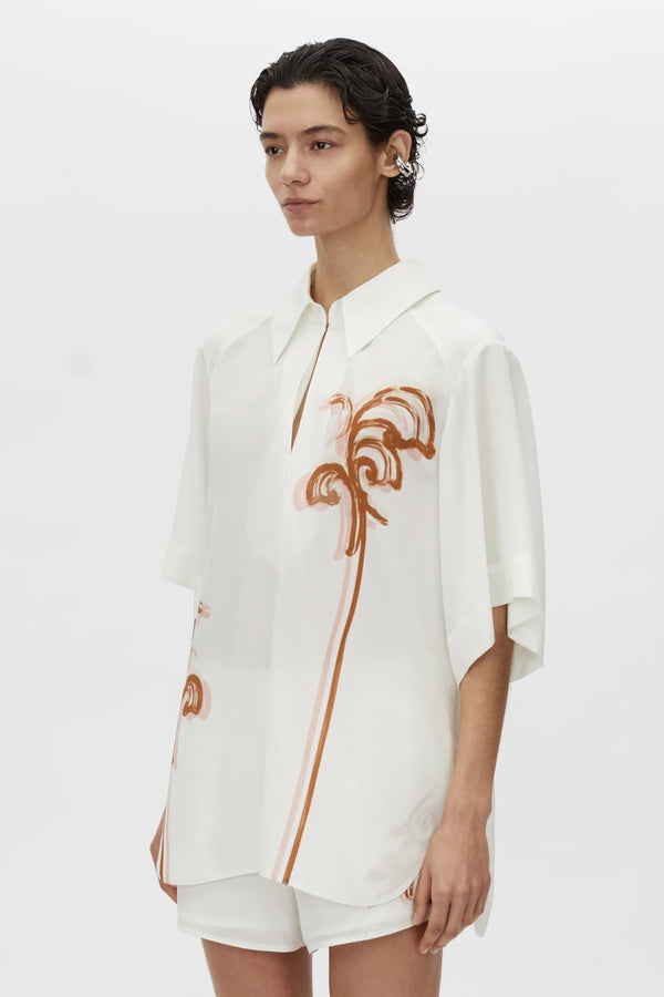 Frida Shirt Cream Frida Print by Camilla and Marc, lightweight silk top with curved hem, hook-and-eye front and modern print.