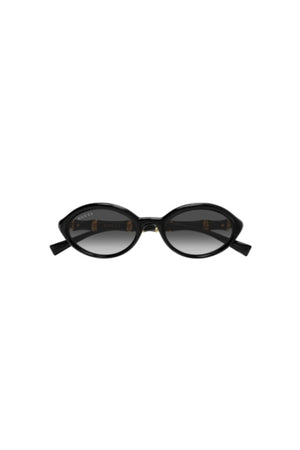 GG2059S001 Black by Gucci – oval sunglasses with bamboo detail and slim frame. Perfect for elevated styling.