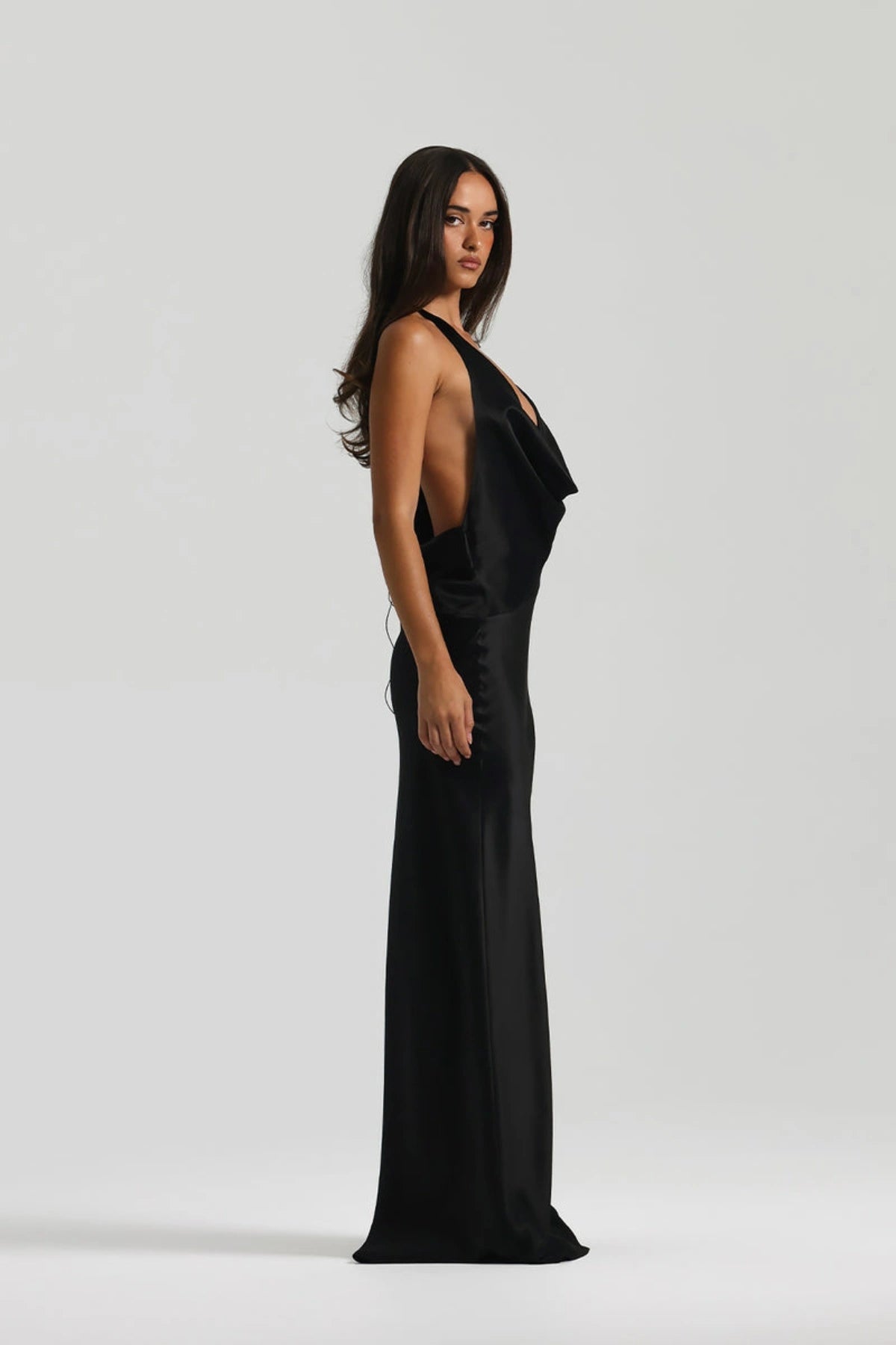 Gabi Gown in Black by Natalie Rolt, handcrafted in Australia from 100% silk with an asymmetric drape and open back for timeless elegance.
