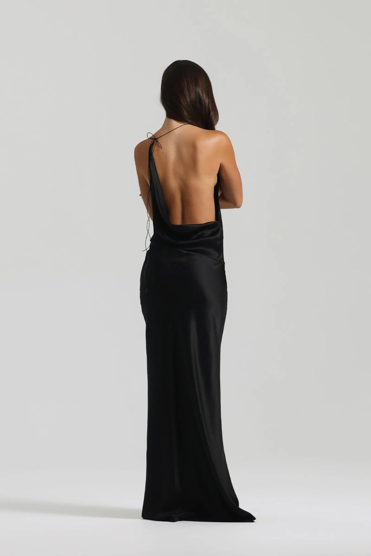 Gabi Gown in Black by Natalie Rolt, handcrafted in Australia from 100% silk with an asymmetric drape and open back for timeless elegance.
