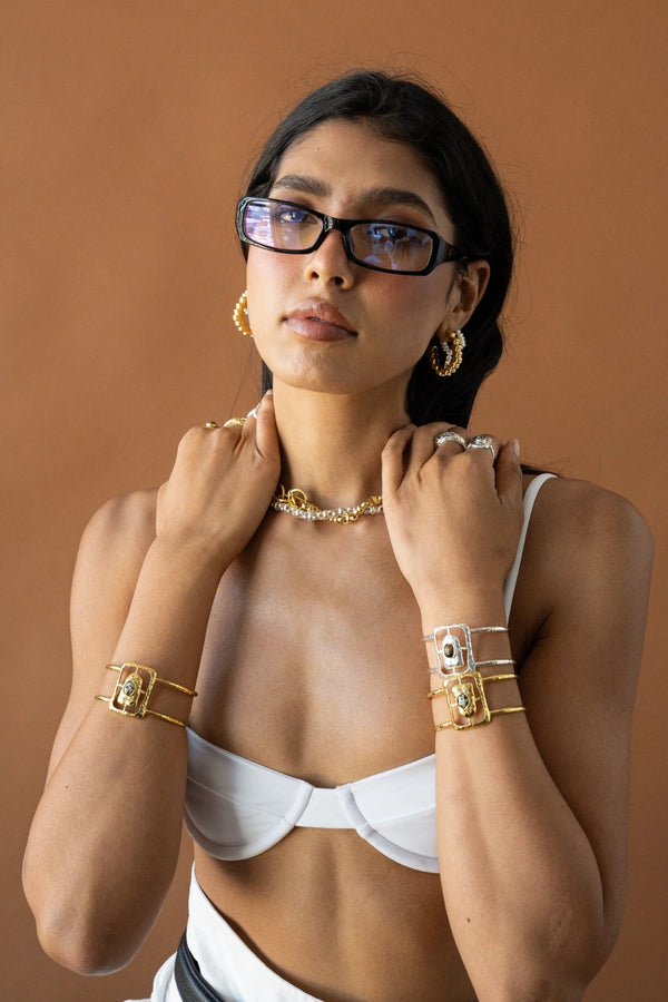 Gabrielle Earrings Gold by Mountain and Moon – sculptural ridged gold hoop earrings with polished finish.