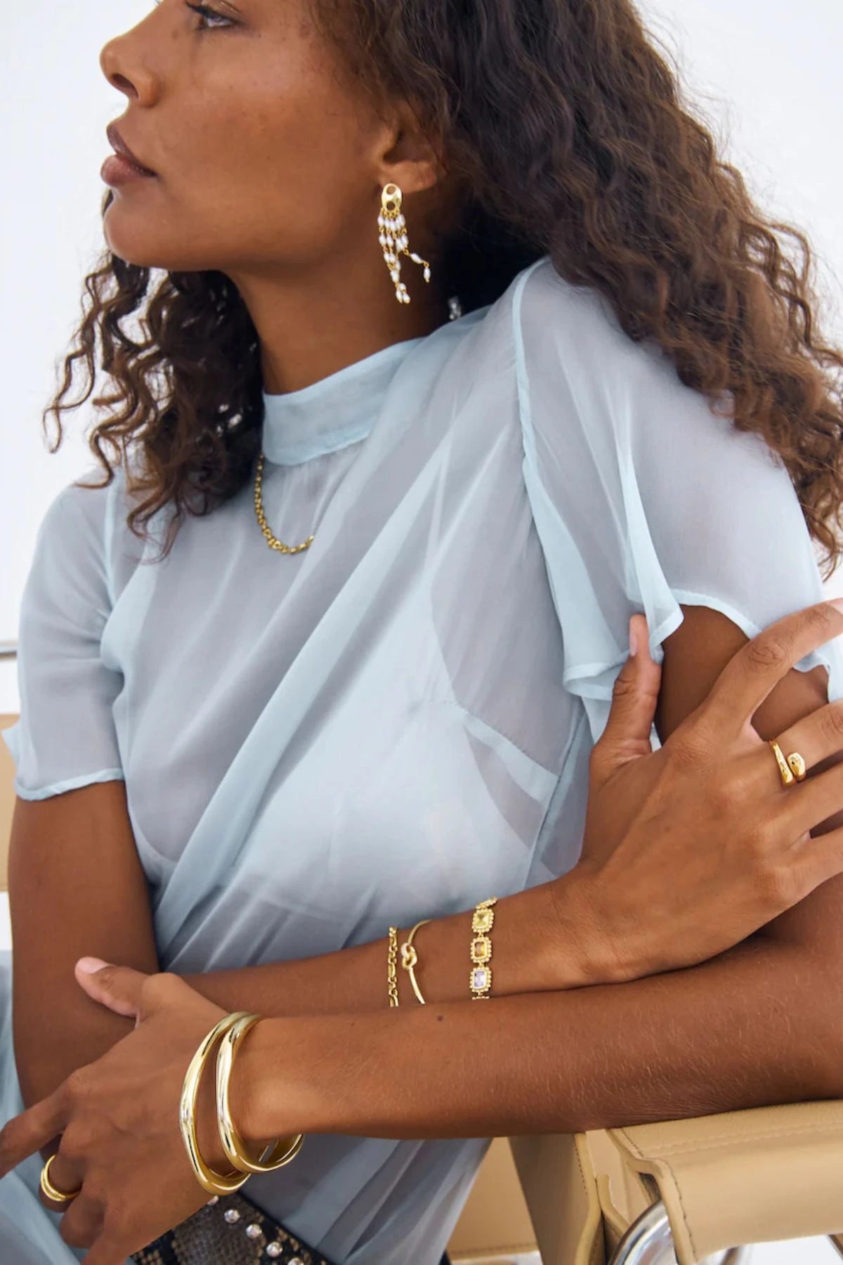 Gabrielle Earrings by Avant Studio, five cascading pearl strands on gold mariner studs. Elegant for events, bridal, or evening wear.