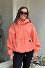 Gemma Polar Fleece Hoodie Flamingo by Camilla and Marc, cozy fleece with luxe leather patch and elastic trims for elevated streetwear appeal.