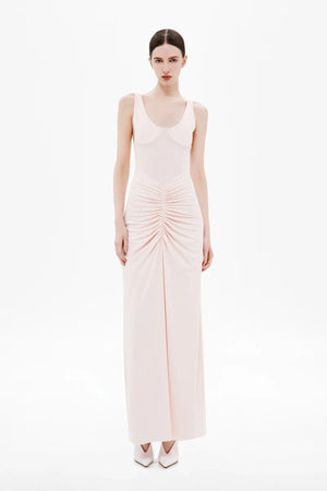 Gisele Jersey Maxi Dress Dusty Pink by MISHA – a fitted maxi with ruched waist and sculpted bust. Perfect for elegant styling.
