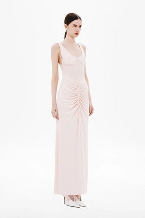 Gisele Jersey Maxi Dress Dusty Pink by MISHA – a fitted maxi with ruched waist and sculpted bust. Perfect for elegant styling.