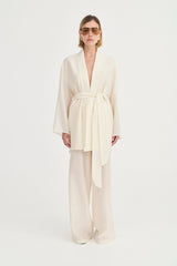 Giulia Pants Ivory Leaf by Solaqua – relaxed straight-leg pants with elastic waistband and subtle leaf print.