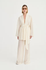 Giulia Pants Ivory Leaf by Solaqua – relaxed straight-leg pants with elastic waistband and subtle leaf print.