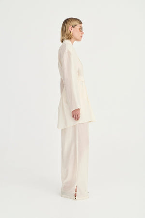 Giulia Pants Ivory Leaf by Solaqua – relaxed straight-leg pants with elastic waistband and subtle leaf print.
