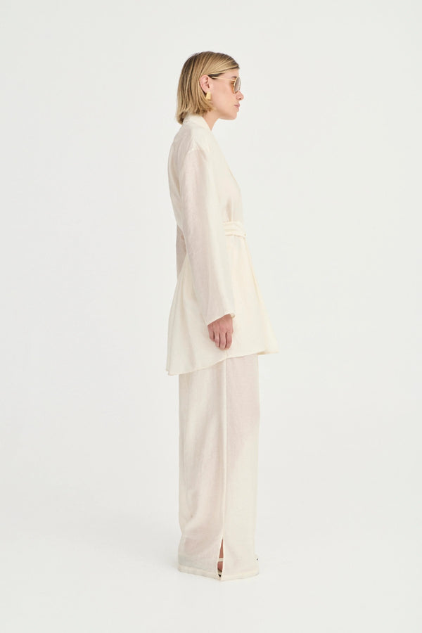 Giulia Pants Ivory Leaf by Solaqua – relaxed straight-leg pants with elastic waistband and subtle leaf print.
