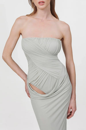Gorgonia Dress in Sage by Maygel Coronel, a ruched strapless column gown with cowl detail. Perfect for formal or resort evenings.
