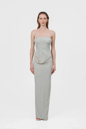 Gorgonia Dress in Sage by Maygel Coronel, a ruched strapless column gown with cowl detail. Perfect for formal or resort evenings.
