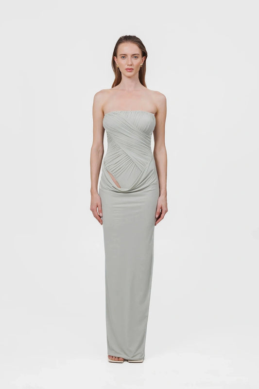 Gorgonia Dress in Sage by Maygel Coronel, a ruched strapless column gown with cowl detail. Perfect for formal or resort evenings.
