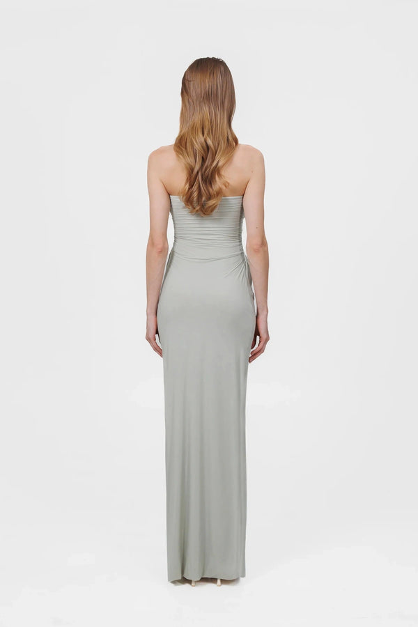 Gorgonia Dress in Sage by Maygel Coronel, a ruched strapless column gown with cowl detail. Perfect for formal or resort evenings.
