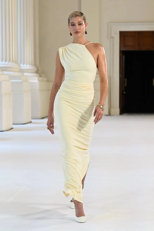 Greer Gown in Lemon by Effie Kats, a one-shoulder stretch crepe gown with elegant ruching, open back, and floor-length hem—modern and refined.