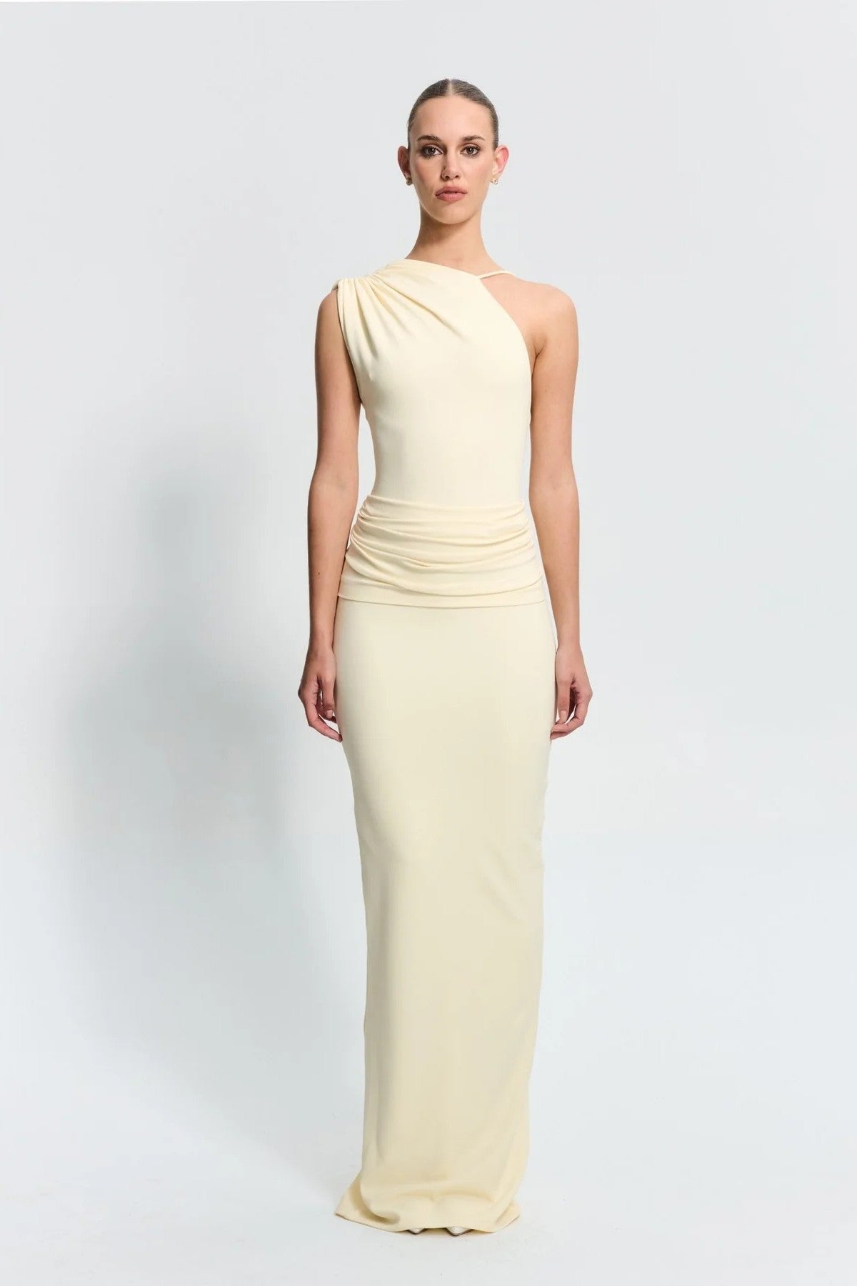 Greer Gown in Lemon by Effie Kats, a one-shoulder stretch crepe gown with elegant ruching, open back, and floor-length hem—modern and refined.