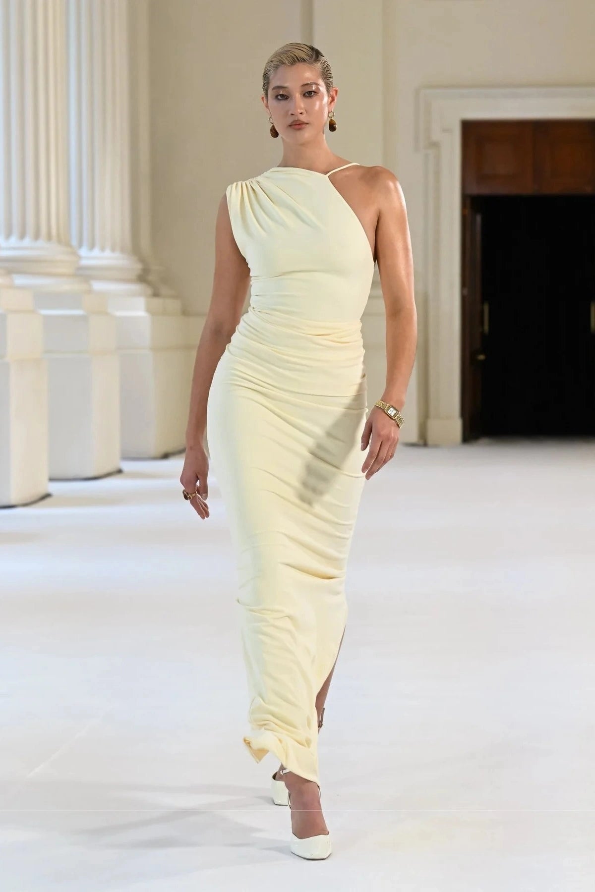 Greer Gown in Lemon by Effie Kats, a one-shoulder stretch crepe gown with elegant ruching, open back, and floor-length hem—modern and refined.