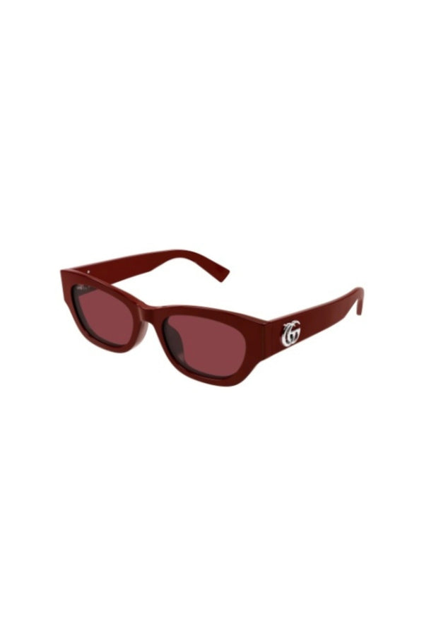 Gucci GG1954SA sunglasses in burgundy acetate with bold red cat-eye lenses and iconic Double G temple logo.
