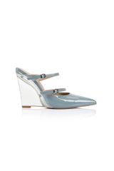 Gwen Wedge in Lucite & Mint Patent by Lana Wilkinson, a pointed-toe mule with adjustable strap and green lucite wedge heel.