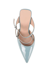 Gwen Wedge in Lucite & Mint Patent by Lana Wilkinson, a pointed-toe mule with adjustable strap and green lucite wedge heel.