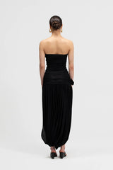 Halo Basalto by Maygel Coronel – ruched strapless midi dress with 3D floral detail and side slit.
