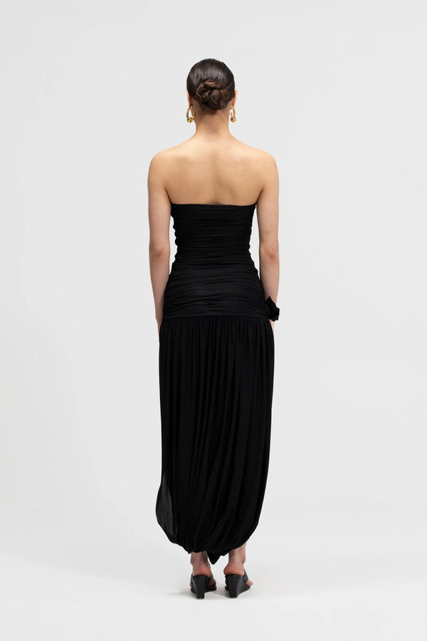 Halo Basalto by Maygel Coronel – ruched strapless midi dress with 3D floral detail and side slit.