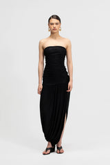 Halo Basalto by Maygel Coronel – ruched strapless midi dress with 3D floral detail and side slit.