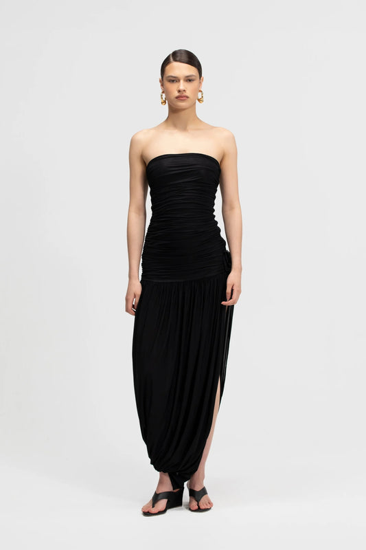 Halo Basalto by Maygel Coronel – ruched strapless midi dress with 3D floral detail and side slit.