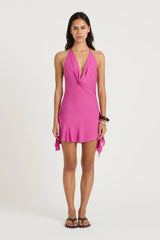 Harlow Mini Dress Fuchsia Pink by Benni, halter cowl neckline with gathered waist and hanky hem skirt, a bold romantic look for special occasions.