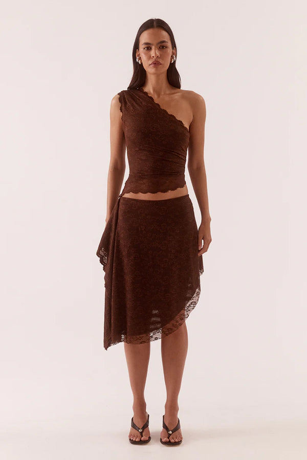 Harper Skirt Chocolate by Sovere – asymmetric lace midi skirt with waterfall drape panel and scalloped hem.
