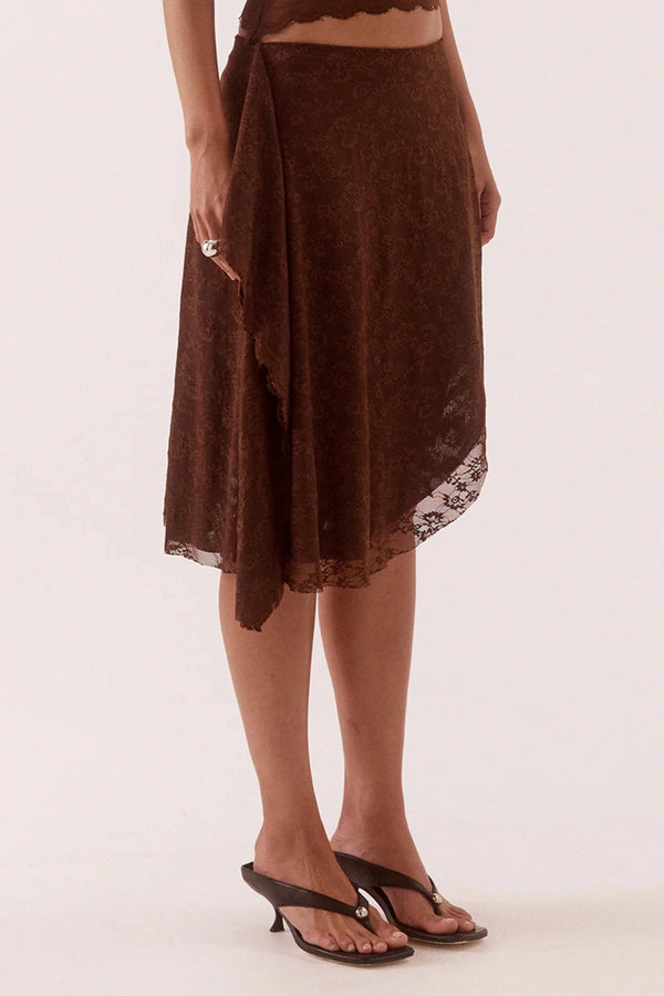 Harper Skirt Chocolate by Sovere – asymmetric lace midi skirt with waterfall drape panel and scalloped hem.