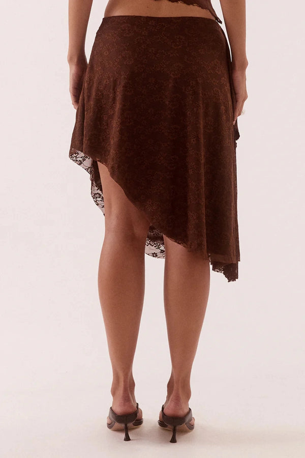 Harper Skirt Chocolate by Sovere – asymmetric lace midi skirt with waterfall drape panel and scalloped hem.
