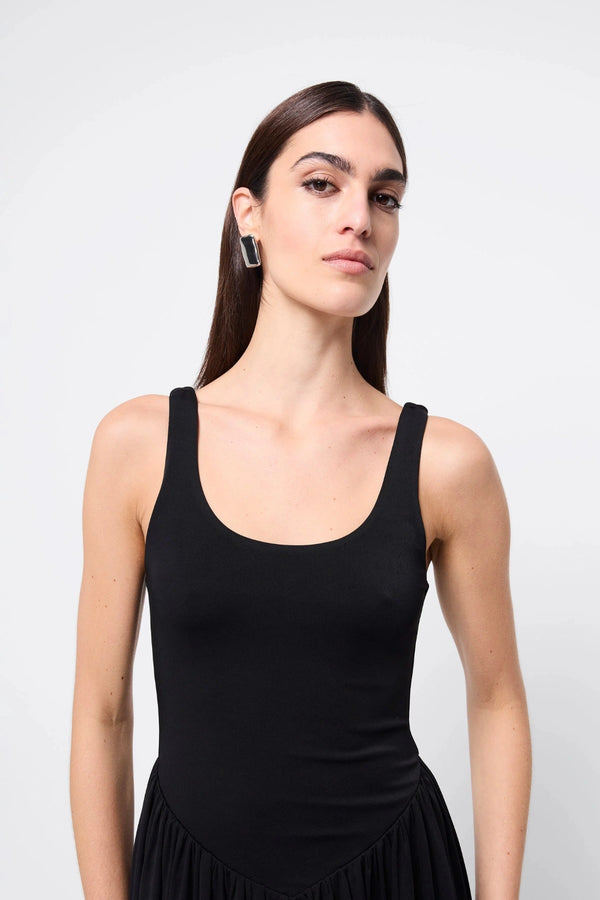 Haven Midi Dress Black by Mossman, a sleeveless sculpted midi with dipped waist and bubble hem. Perfect for day to night wear.