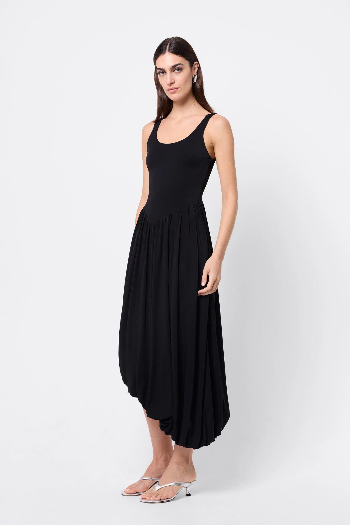 Haven Midi Dress Black by Mossman, a sleeveless sculpted midi with dipped waist and bubble hem. Perfect for day to night wear.