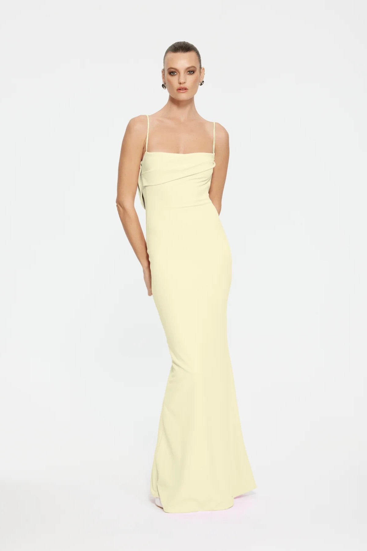 Havilland Gown in Lemon by Effie Kats – sleek crepe gown with low draped back and straight neckline. A perfect look for elegant evenings.