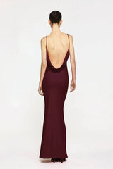 Havilland Gown in Wine by Effie Kats, elegant straight-neck silhouette with delicately draped low back, crafted in soft stretch crepe for a refined evening look.