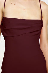 Havilland Gown in Wine by Effie Kats, elegant straight-neck silhouette with delicately draped low back, crafted in soft stretch crepe for a refined evening look.
