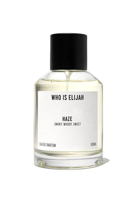 Haze by Who Is Elijah, a unisex scent with pink pepper, orange blossom, clove, chestnut, cedarwood, vanilla, and warm woods.
