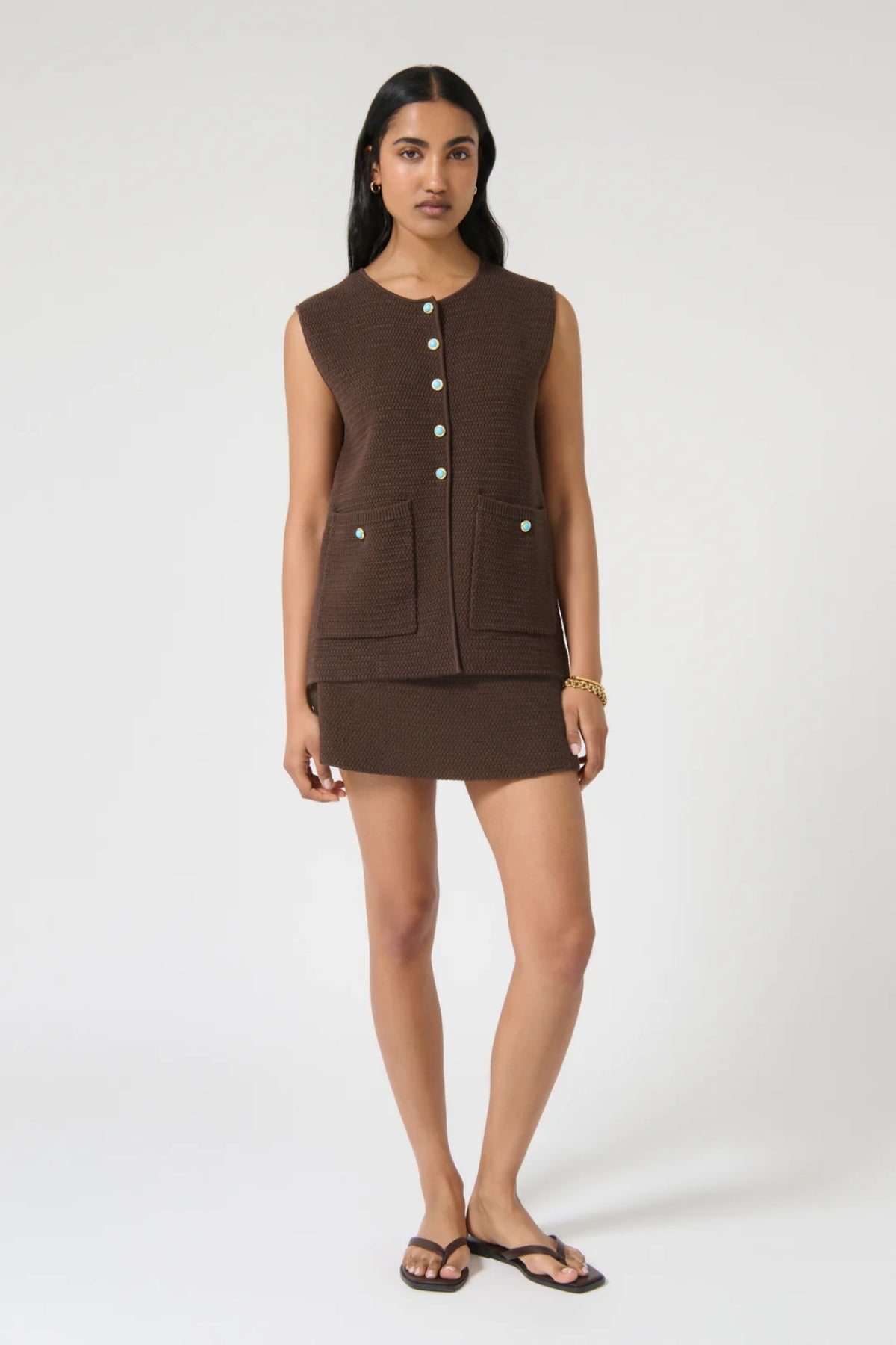 Helena Gilet by Onte — a chocolate cotton crochet-style vest with enamel buttons and a relaxed fit, perfect for effortless layered looks.